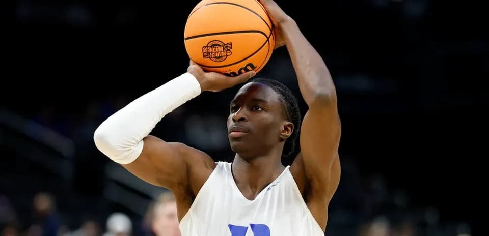 Player shooting a basketball during practice session