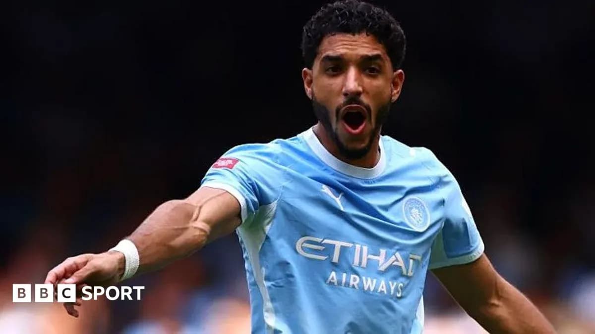 Player celebrating during a match in light blue jersey