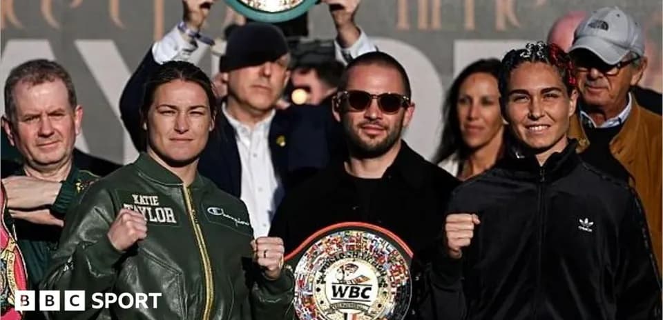 Katie Taylor and opponent at press conference holding belts