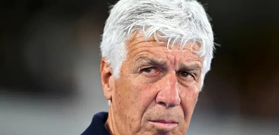 Coach with gray hair during a match