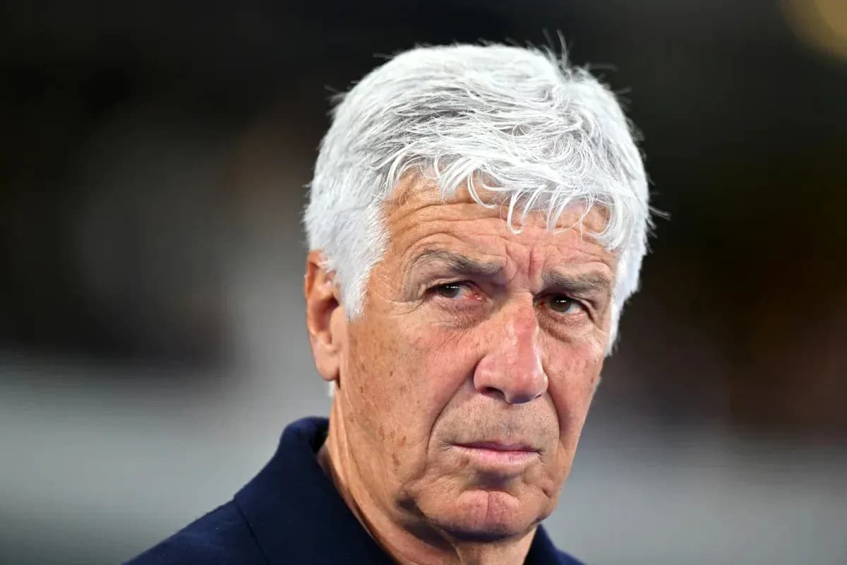Coach with gray hair during a match