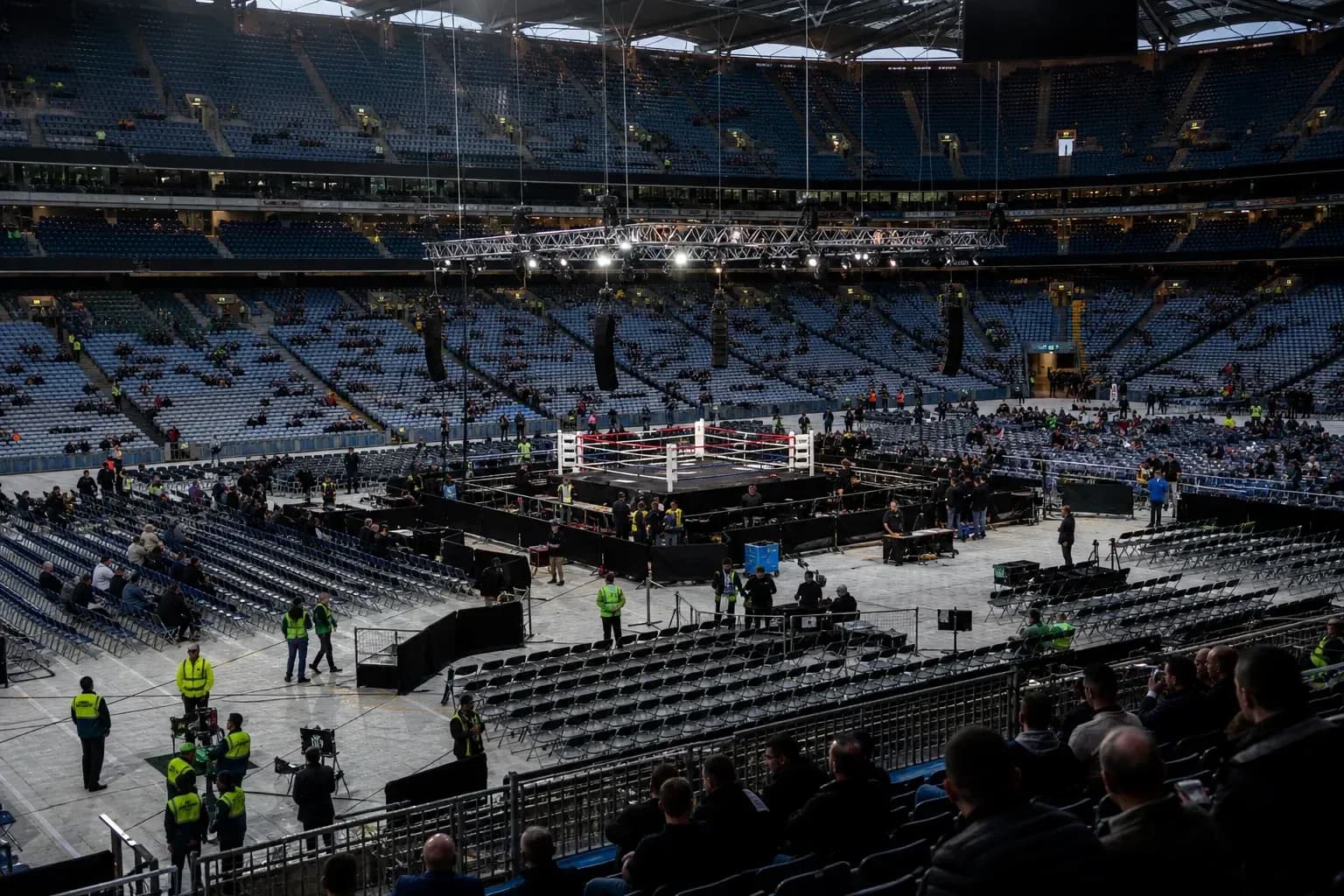 Boxing ring setup in empty stadium before event