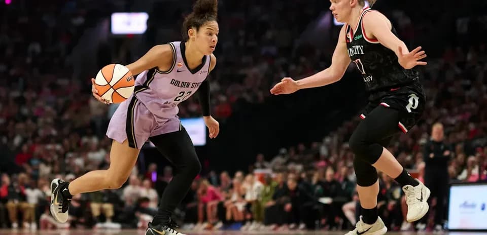 Player dribbling basketball during game action