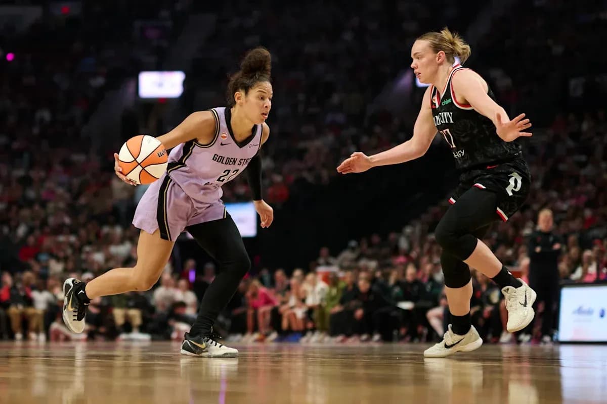Player dribbling basketball during game action