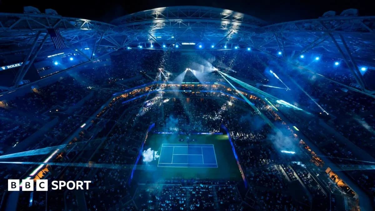 Aerial view of a tennis match at night