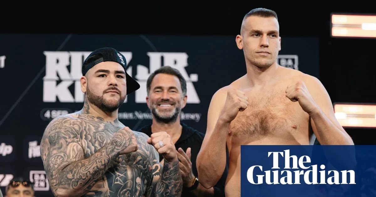 Two boxers posing at weigh-in event with promoter