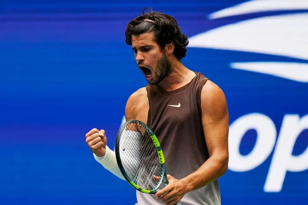 Tennis player celebrating a point during match