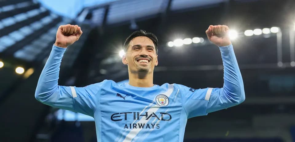 Player celebrating victory with raised arms