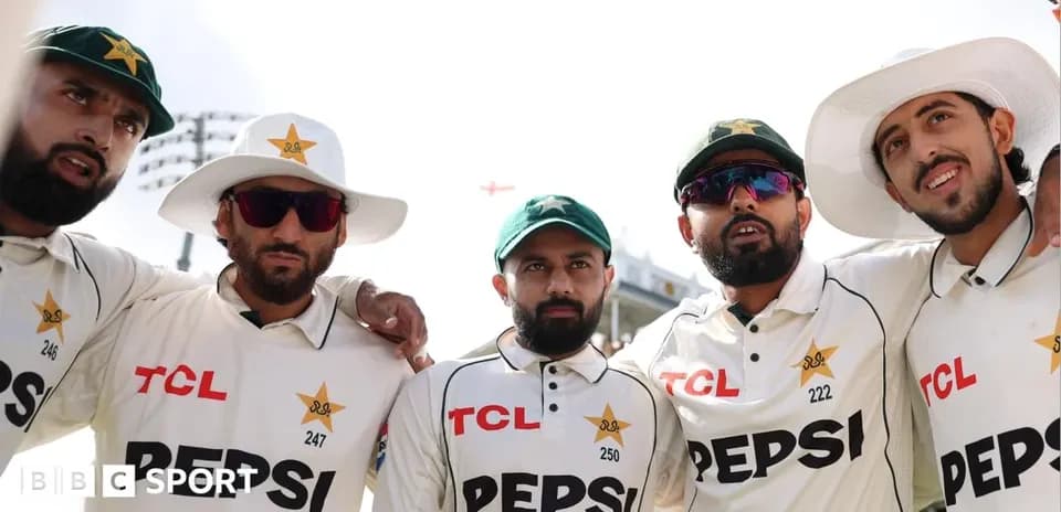 Pakistani cricket players posing together in team uniforms