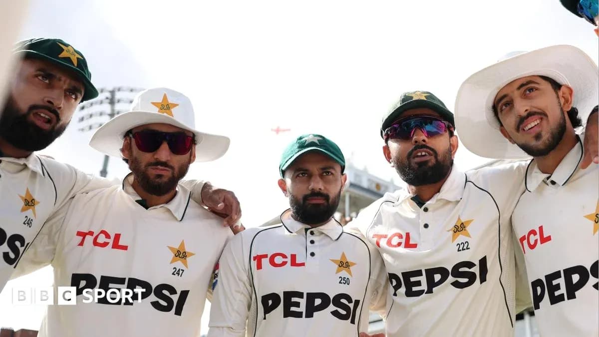Pakistani cricket players posing together in team uniforms
