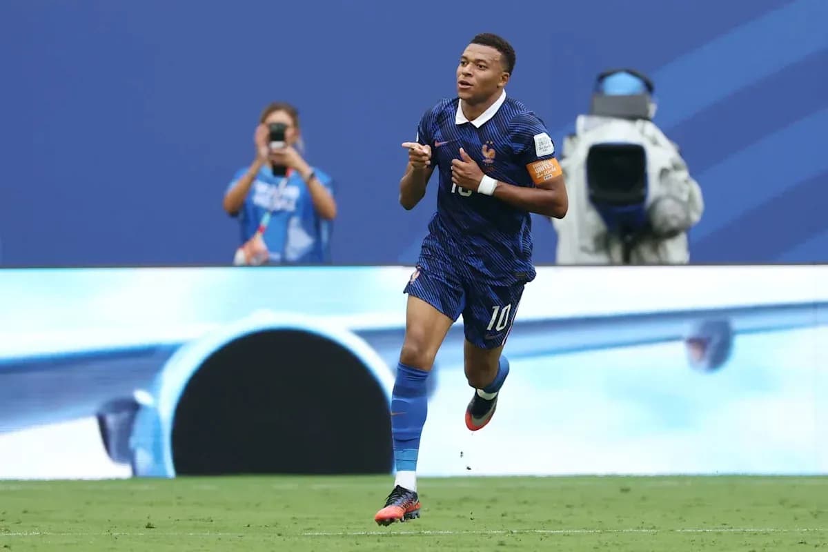 Player celebrating goal in France kit during match