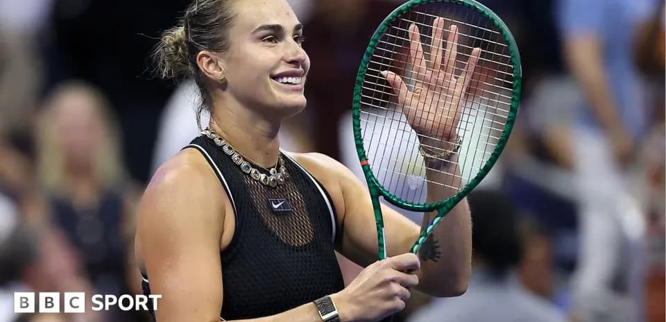 Player waving after winning a tennis match
