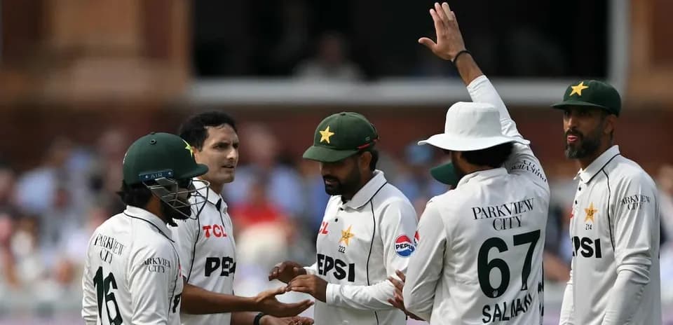 Pakistani cricket team celebrating a wicket during match