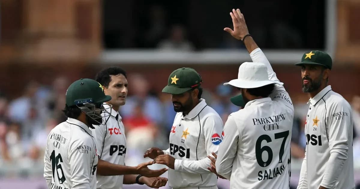 Pakistani cricket team celebrating a wicket during match