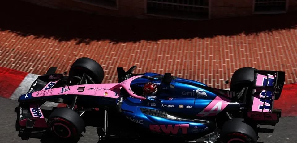 Race car navigating a corner on a street circuit