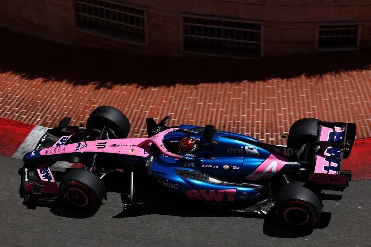 Race car navigating a corner on a street circuit