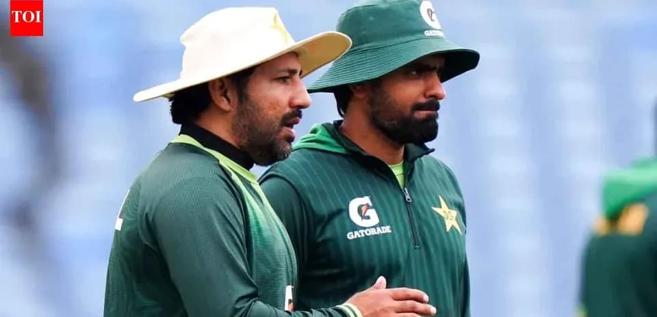 Two Pakistan cricket players discussing during practice