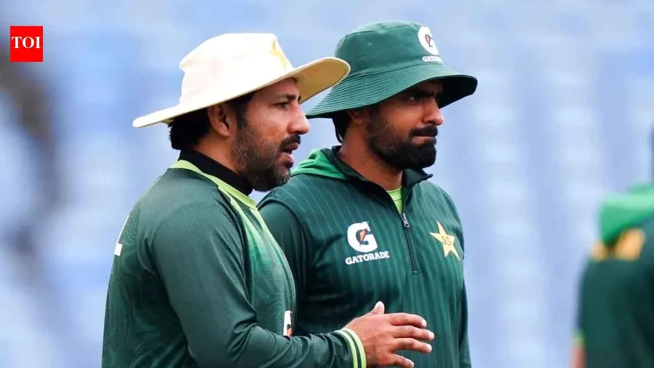 Two Pakistan cricket players discussing during practice