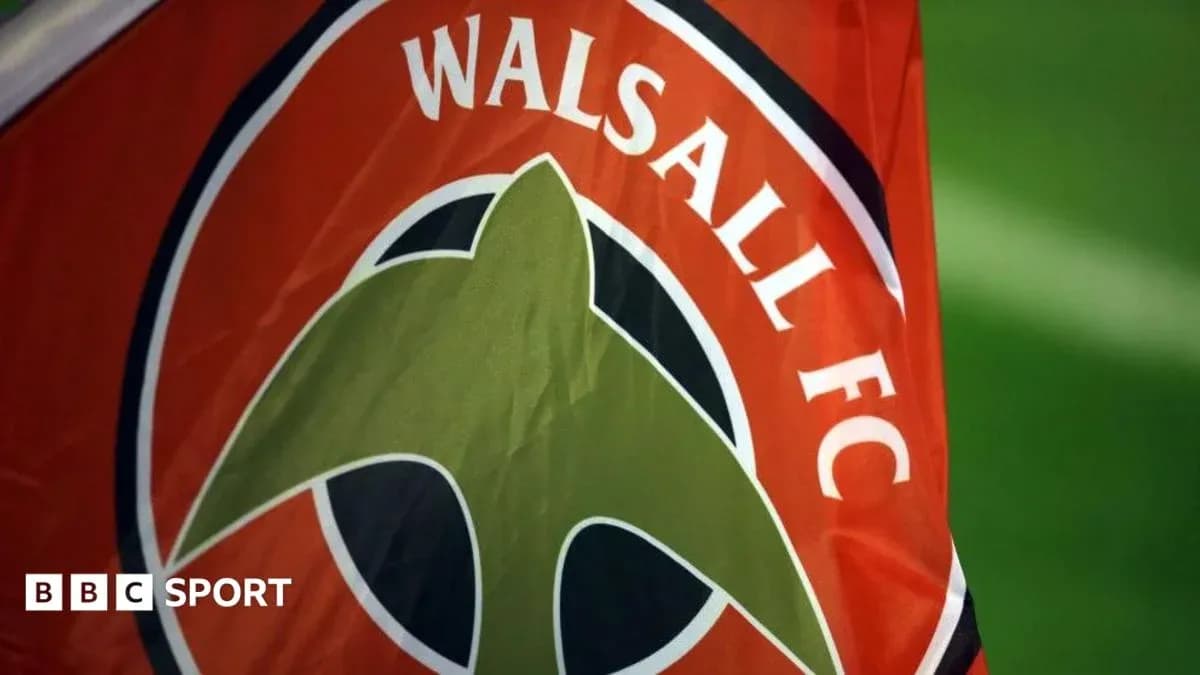 Walsall FC flag with team logo displayed Walsall FC flag with team logo displayed