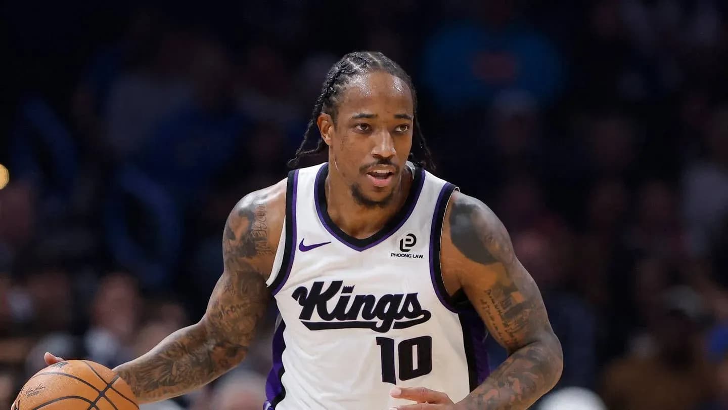 Player dribbling basketball during a game Player dribbling basketball during a game