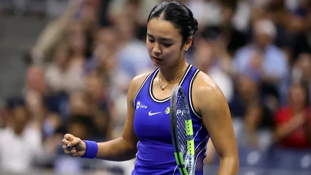 Tennis player celebrating after winning a point Tennis player celebrating after winning a point
