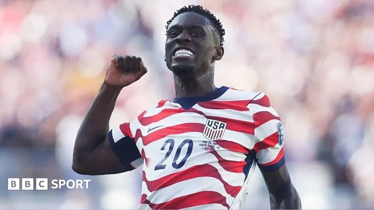 Player celebrating with fist pump in USA jersey Player celebrating with fist pump in USA jersey