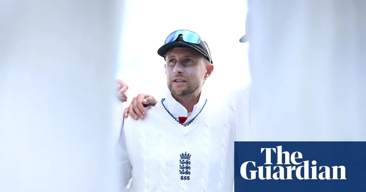 Cricketer in white sweater during team huddle Cricketer in white sweater during team huddle