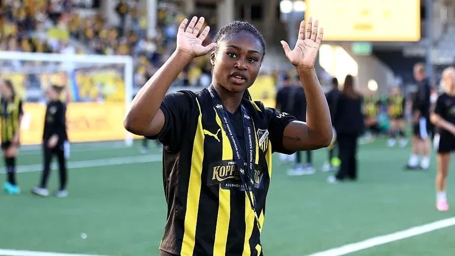 Player waving on the field after the match Player waving on the field after the match