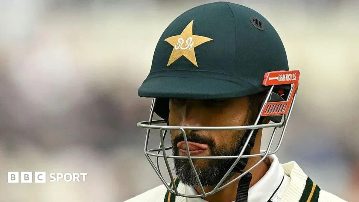 Cricketer wearing helmet during match preparation Cricketer wearing helmet during match preparation