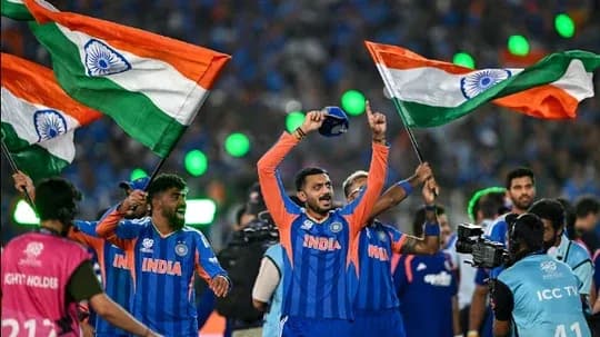 Players celebrating with Indian flags after victory Players celebrating with Indian flags after victory