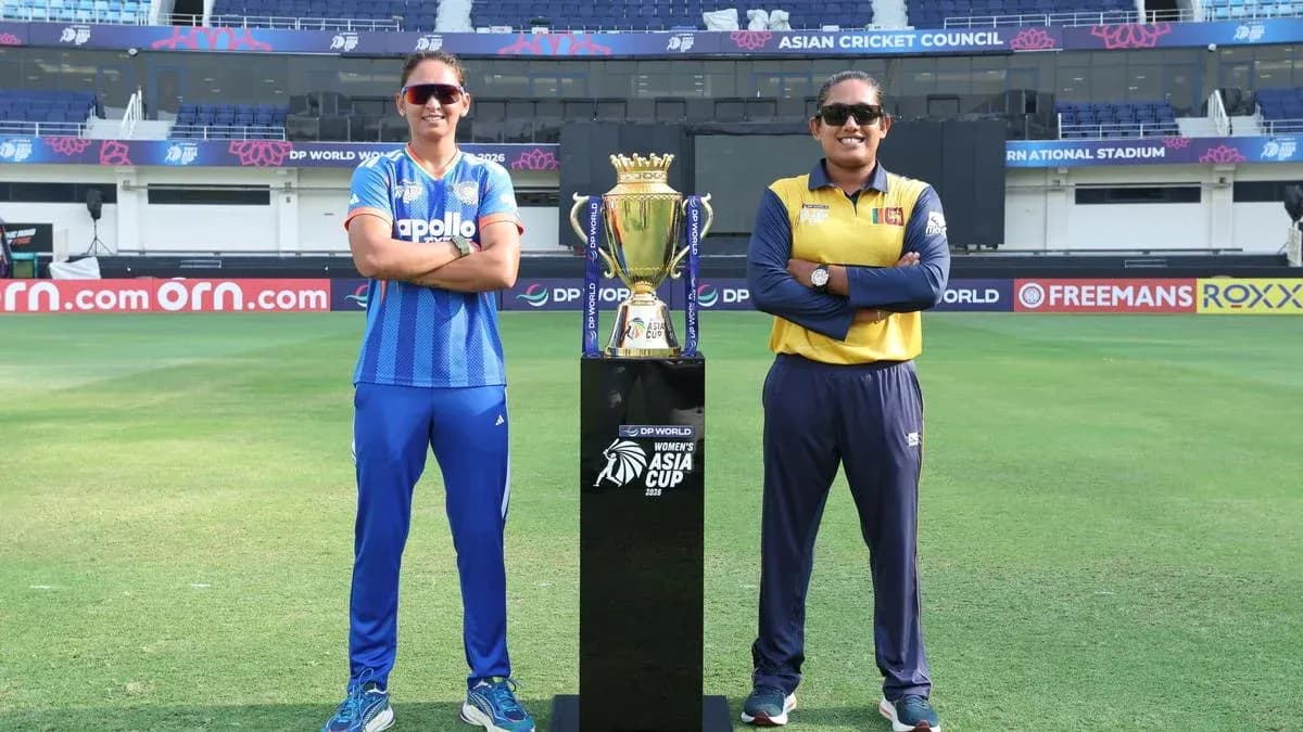 Two cricket captains posing with Asia Cup trophy Two cricket captains posing with Asia Cup trophy