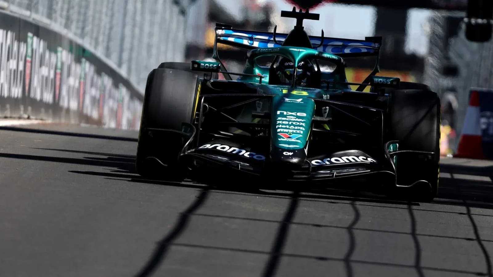 Formula 1 car racing on track during event Formula 1 car racing on track during event