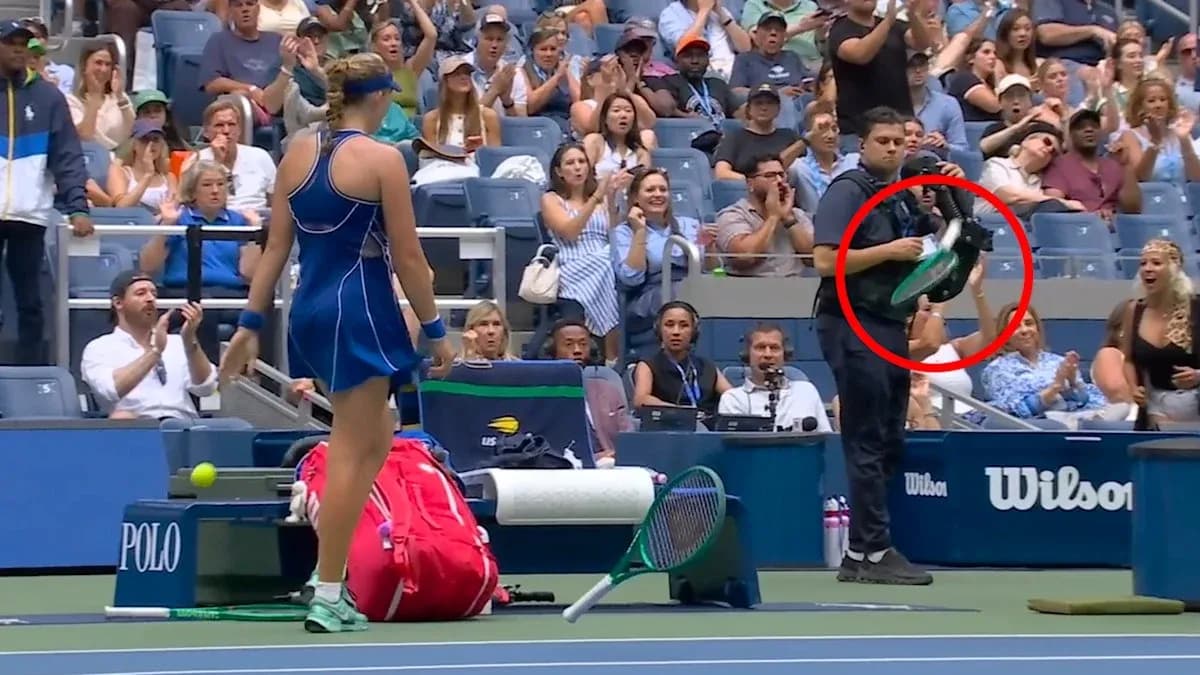 Player preparing to serve with crowd applauding Player preparing to serve with crowd applauding
