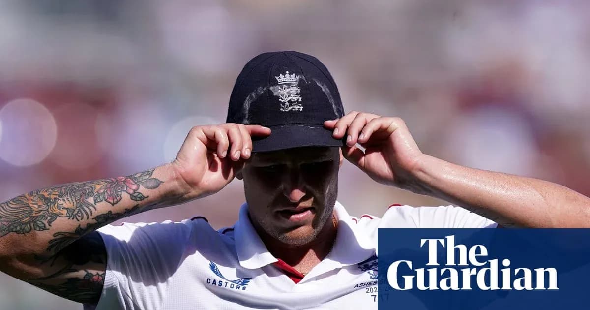 Cricketer adjusting his cap during a match Cricketer adjusting his cap during a match