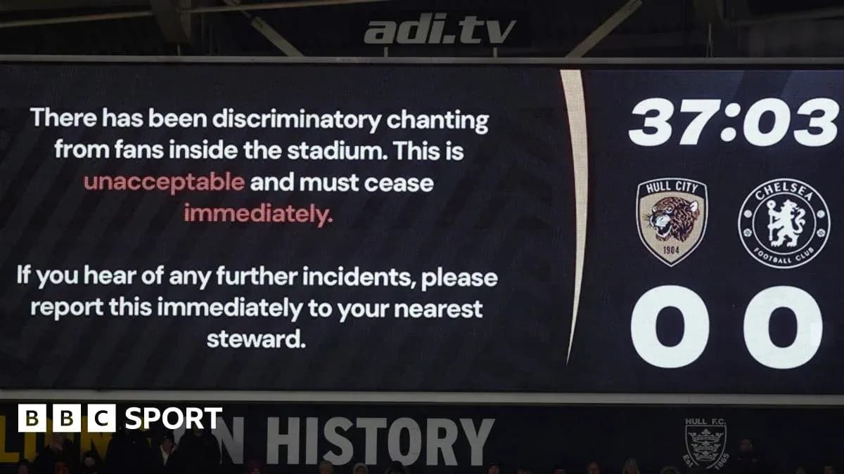 Scoreboard displaying discriminatory chanting announcement during match Scoreboard displaying discriminatory chanting announcement during match