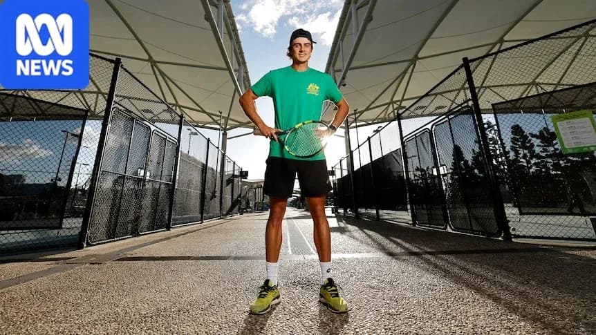 Tennis player posing with racket at court Tennis player posing with racket at court