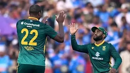 South African players celebrating a wicket on field South African players celebrating a wicket on field