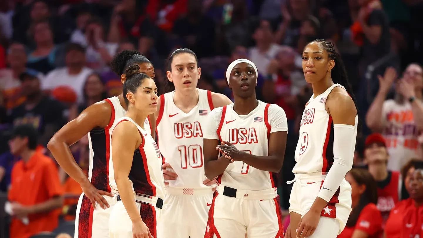USA women's basketball team strategizing during game USA women's basketball team strategizing during game