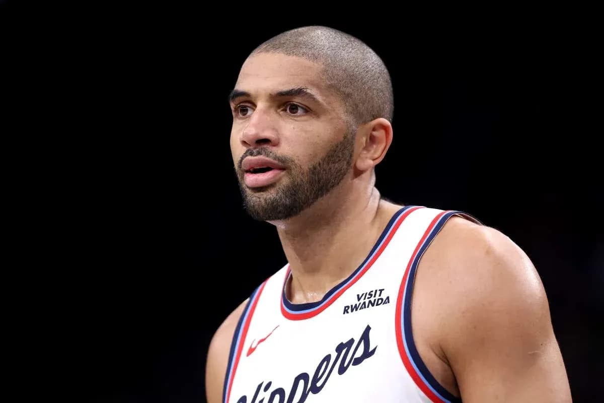Basketball player in Clippers uniform during game Basketball player in Clippers uniform during game
