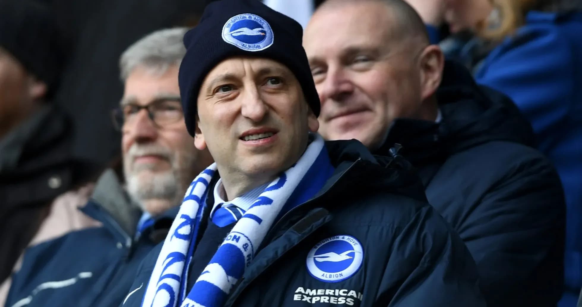 Man in Brighton scarf and hat at stadium Man in Brighton scarf and hat at stadium
