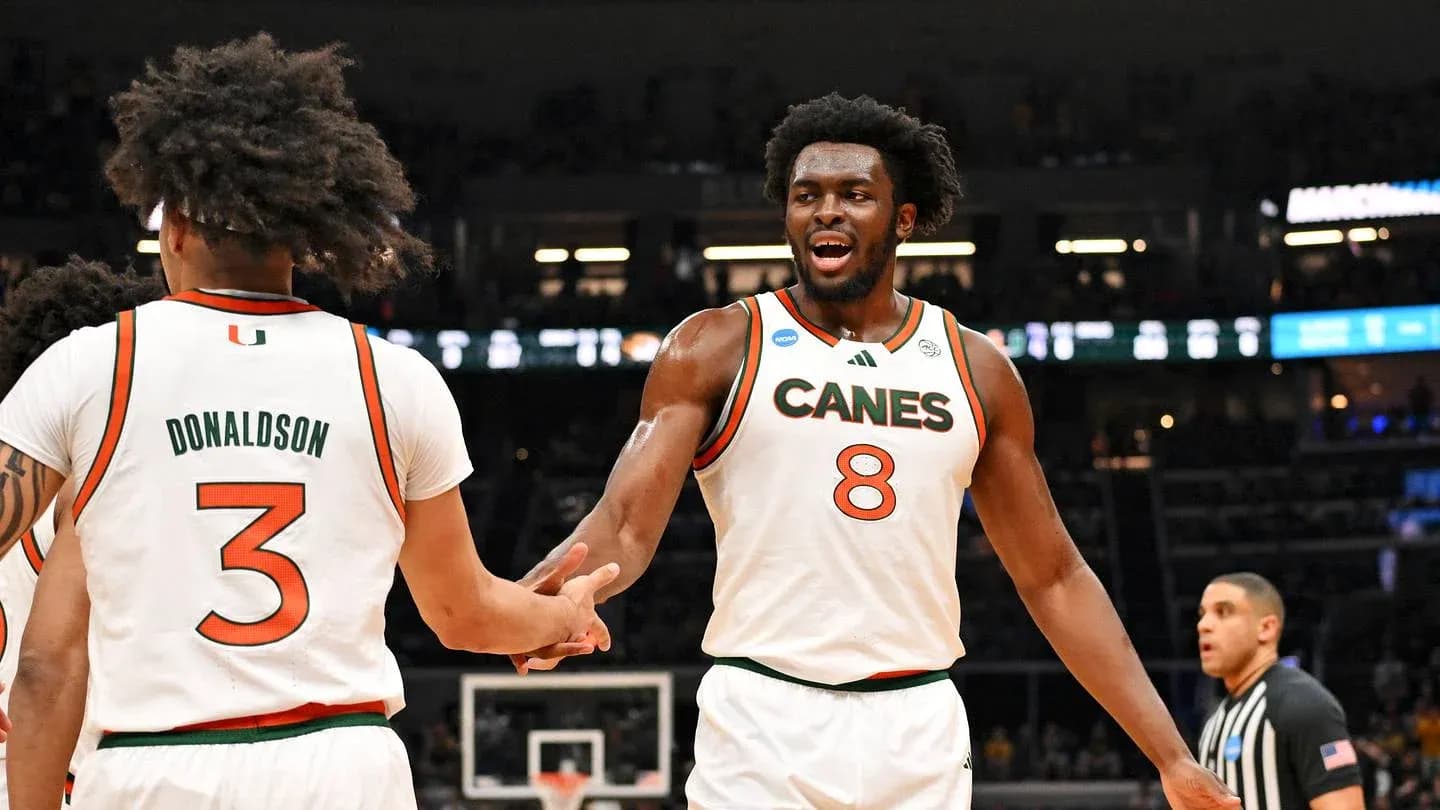 Miami players celebrating during NCAA tournament game Miami players celebrating during NCAA tournament game