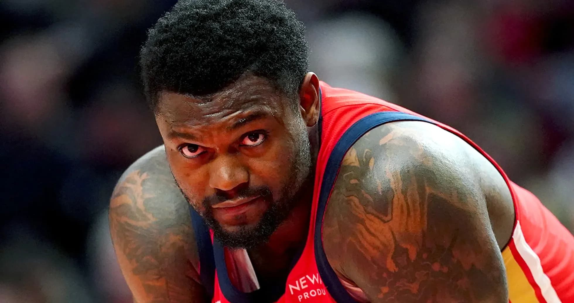 Basketball player focused during a game Basketball player focused during a game