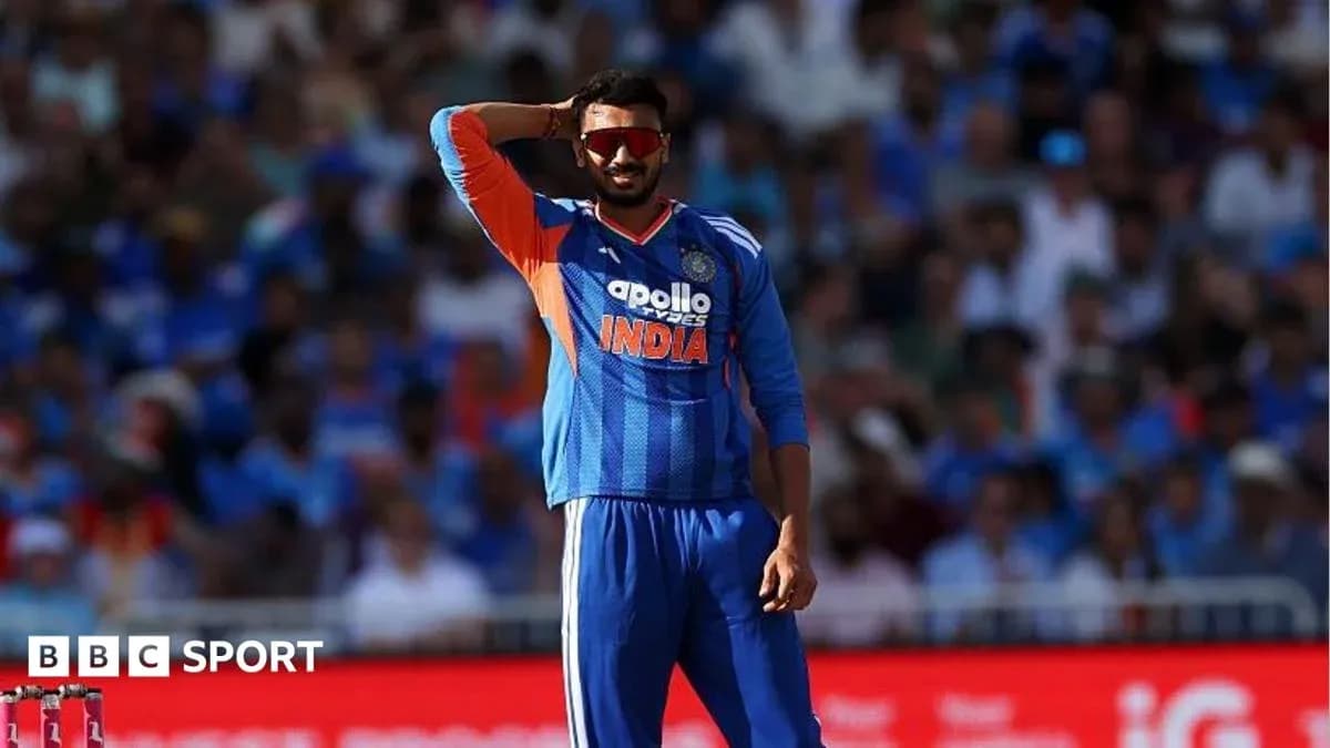 Cricketer in India jersey gesturing during match Cricketer in India jersey gesturing during match