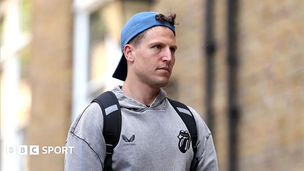 Man walking with backpack and cap in urban setting Man walking with backpack and cap in urban setting
