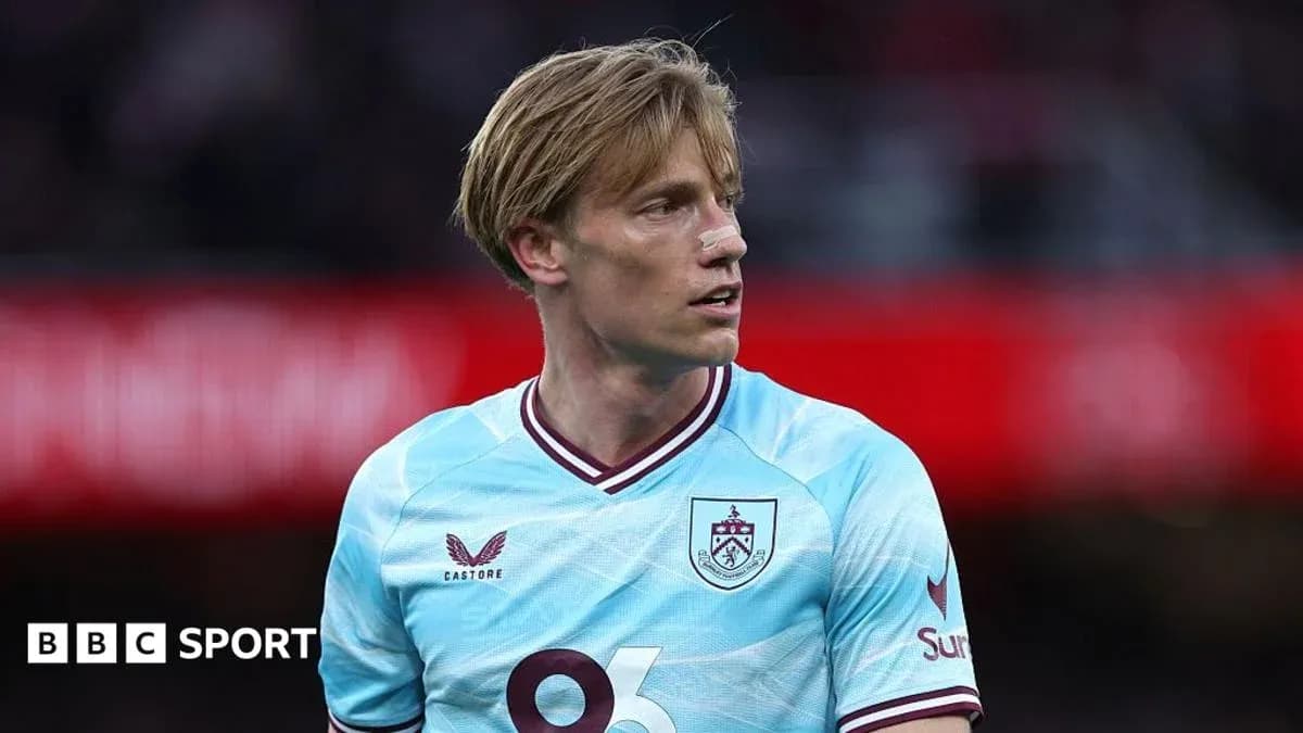 Player in light blue Burnley jersey during match Player in light blue Burnley jersey during match