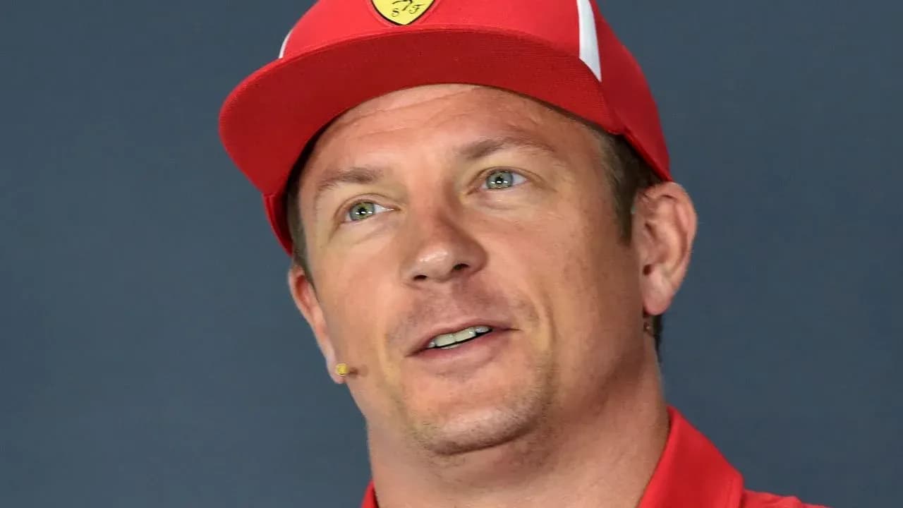 Driver wearing red cap during press conference Driver wearing red cap during press conference