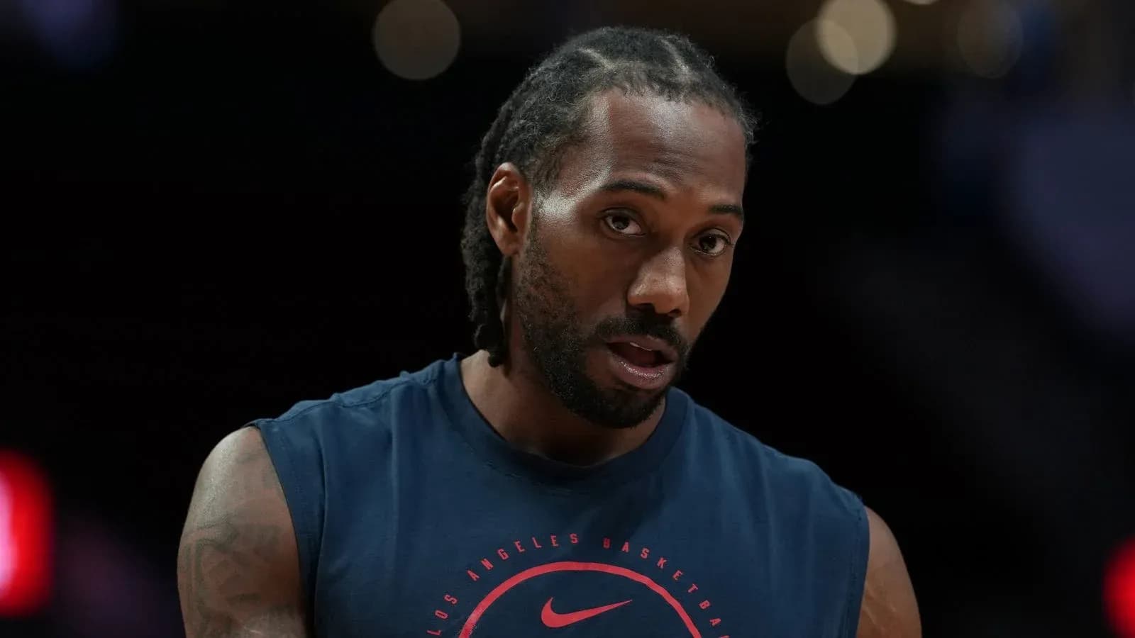 Player in warm-up shirt before basketball game Player in warm-up shirt before basketball game