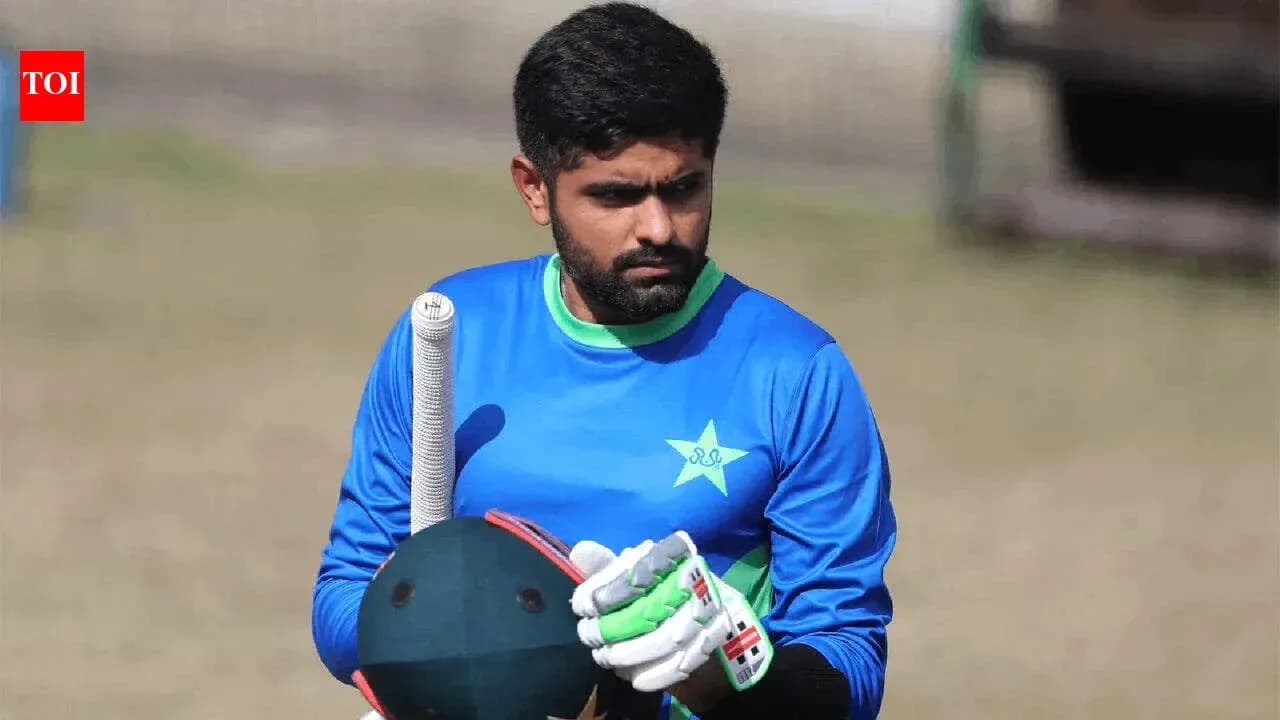 Cricketer holding bat during practice session Cricketer holding bat during practice session