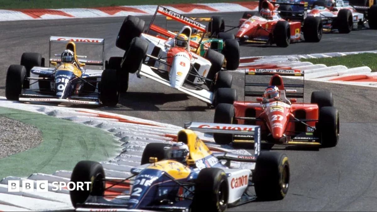 Formula 1 cars racing on track during competition Formula 1 cars racing on track during competition
