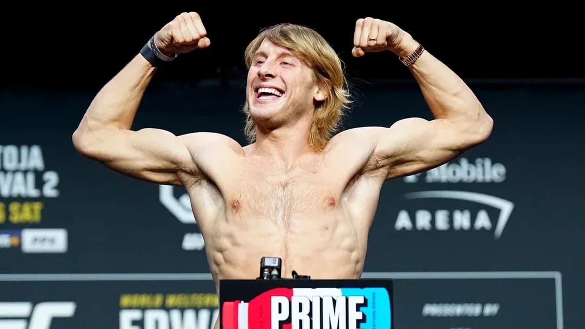 Fighter flexing muscles at weigh-in event Fighter flexing muscles at weigh-in event